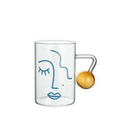 Glass Cup with Face Design