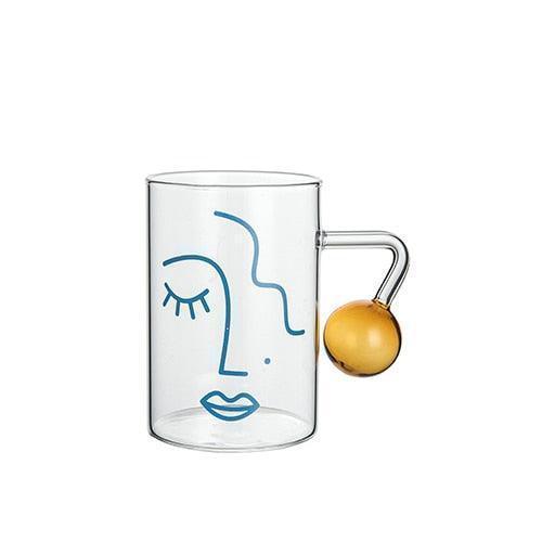 Glass Cup with Face Design