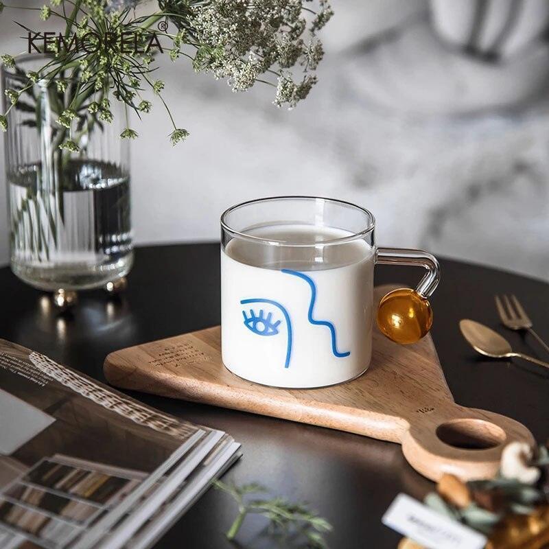 Glass Cup with Face Design