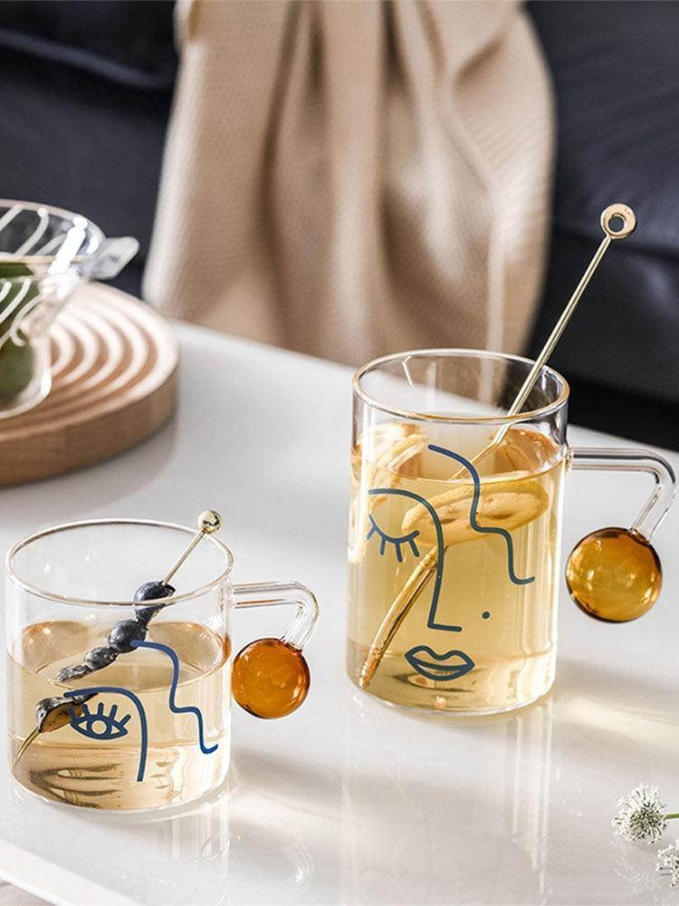 Glass Cup with Face Design
